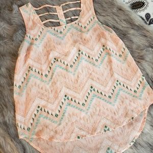 Tank/blouse with beautiful back detail.